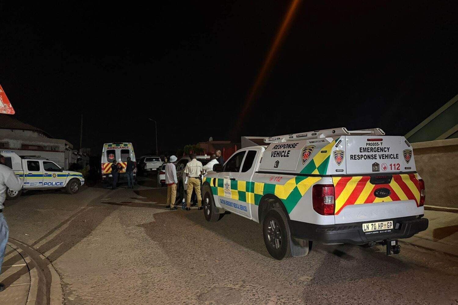 Police vehicles outside home during Mamelodi hostage standoff