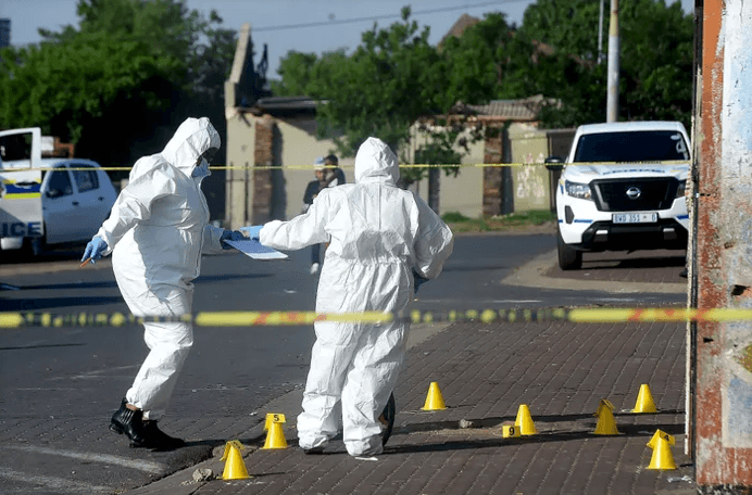 Police forensics at the scene of the shooting