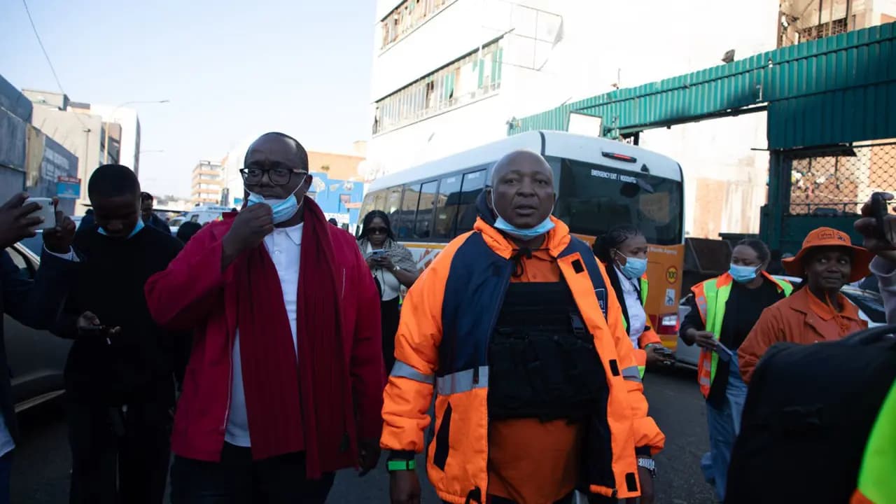 Acting Johannesburg Mayor Kenny Kunene right and Public Safety MMC Mgcini Tshwaku left during raids on buildings in Johannesburgs CBD