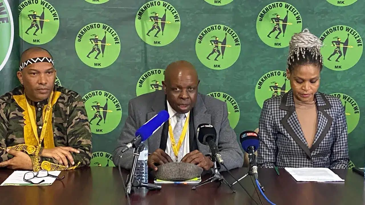 MK Partys parliamentary leader John Hlophe centre and the partys chief whip Colleen Makhubele right during a media briefing in Parliament
