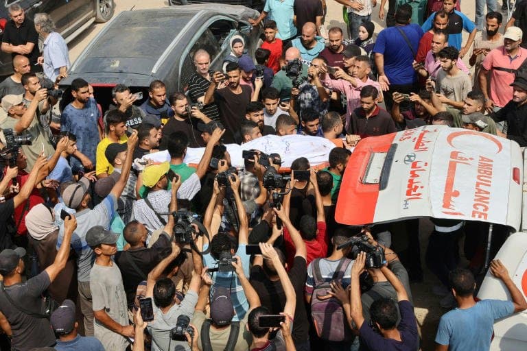 Mourners gather in Gaza for funeral of Al Jazeera staff killed by Israel