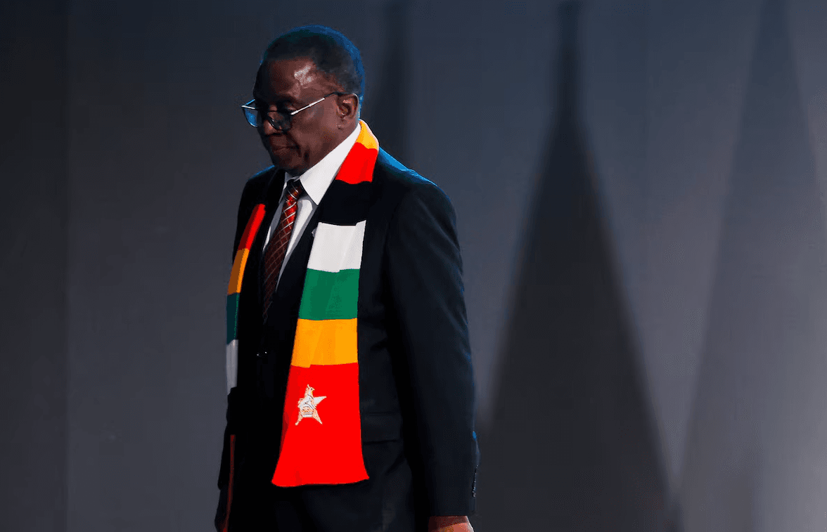 Zimbabwe's President Emmerson Mnangagwa walks on stage during the United Nations climate change conference COP29, in Baku, Azerbaijan November 2024.