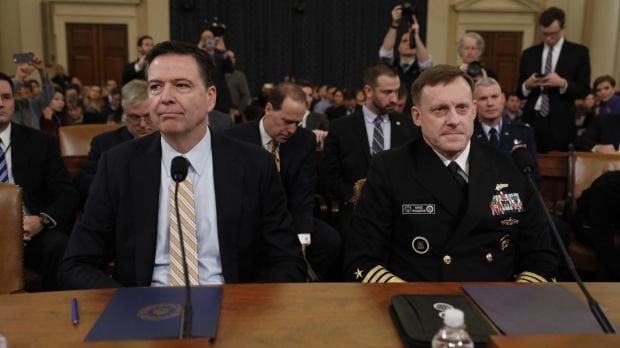 ames Comey left and Michael Rogers right await the beginning of a House Intelligence Committee | Report Focus News