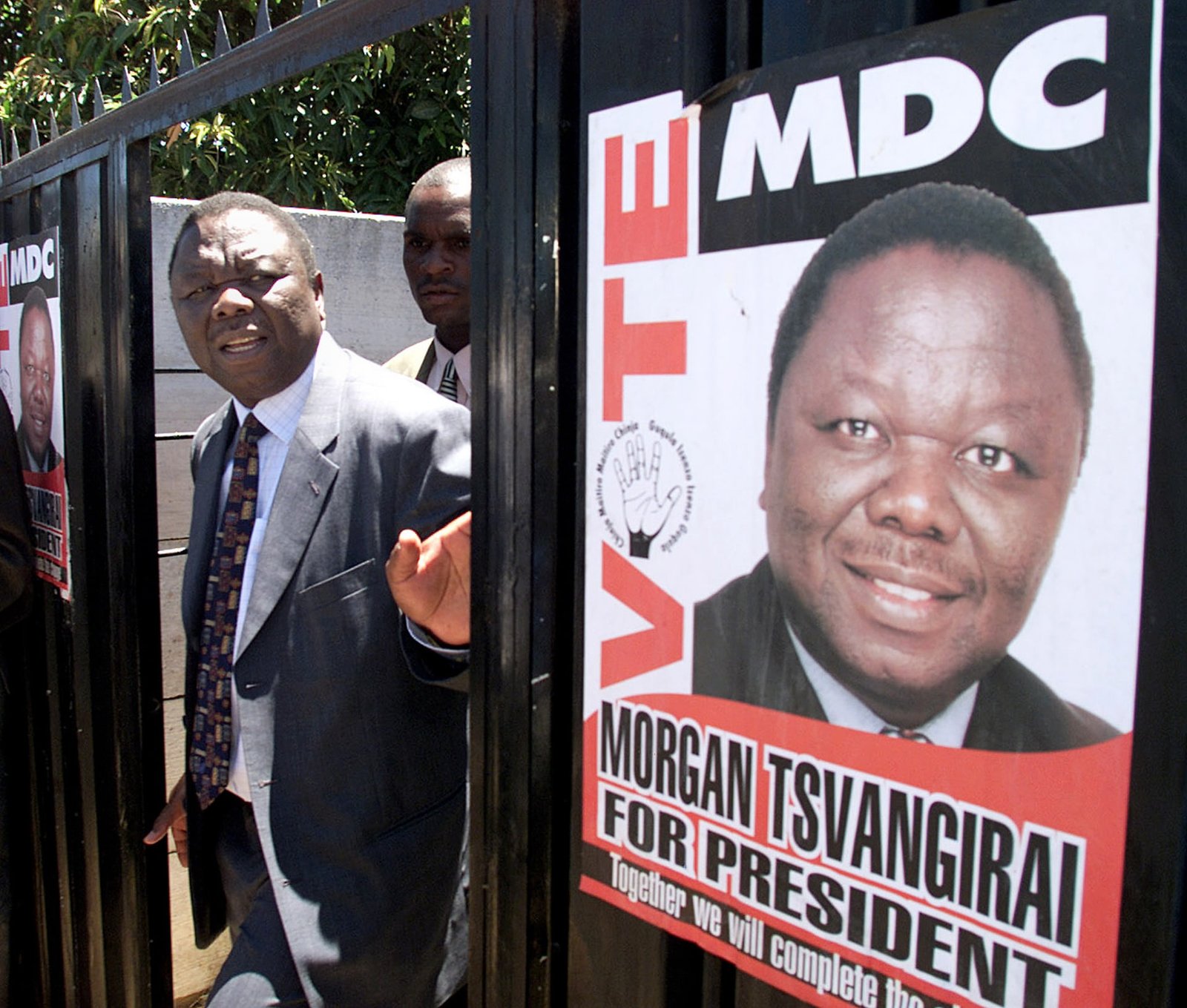 Tsvangirai leaves the house of MDC MP Tafadzwa Musekiwa in February 2002 after it was attacked by Zanu PF supporters | Report Focus News