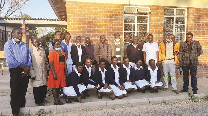 Health and Child Care Deputy Minister Dr John Mangwiro standing sixth from right with Chief Chivese to his right trainee nurses lecturers and councillors at Chivhu General Hospital | Report Focus News