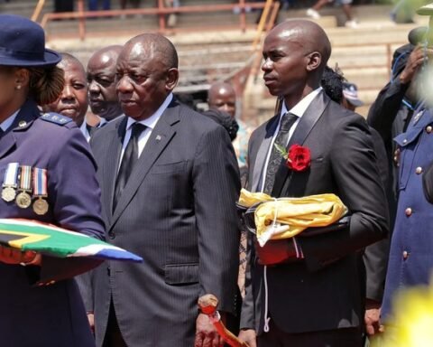 President Cyril Ramaphosa alongside Tumi Mboweni the eldest son of the late former finance minister Tito Mboweni Picture GCIS